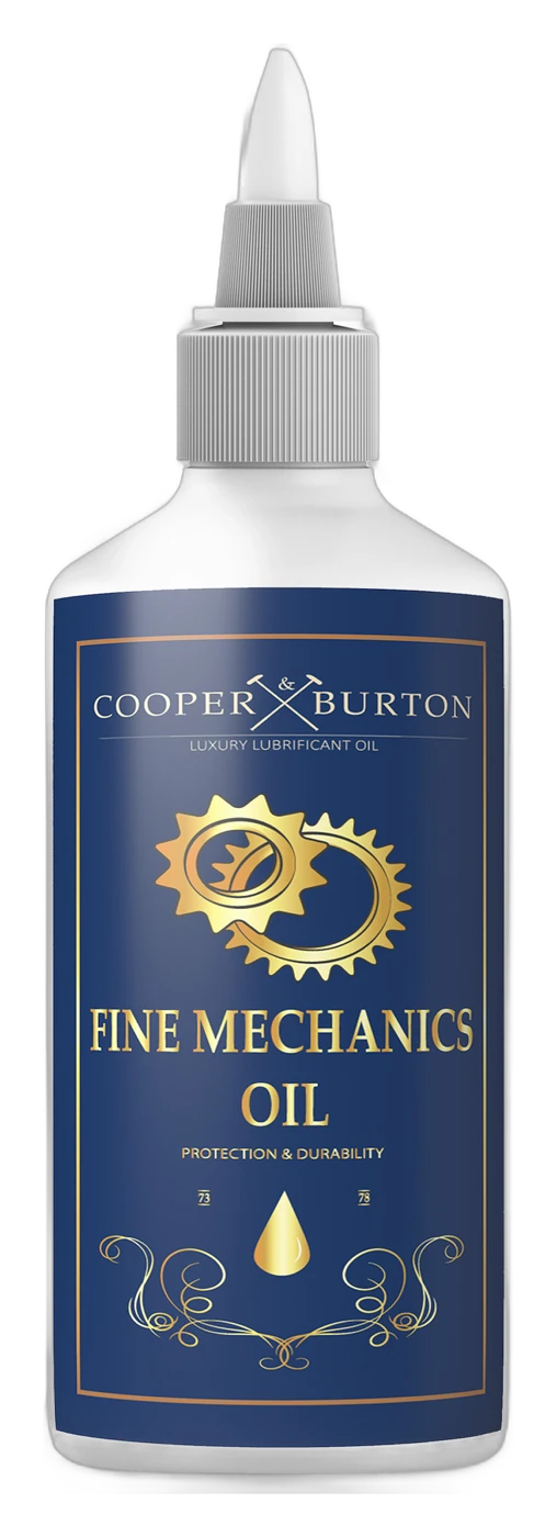 Finest Mechanics Oil, dunkelblaue Flasche mit Goldetikett